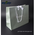 luxury green gift paper shopping paper bag with a knot